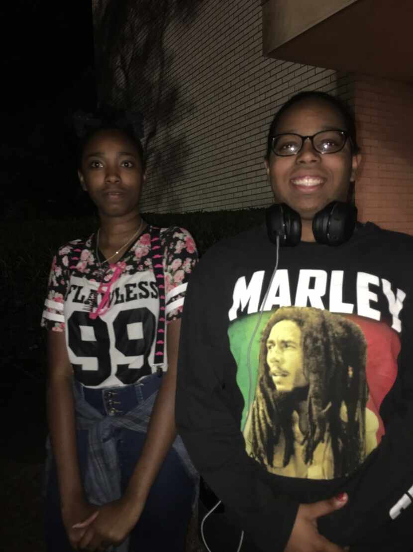 Sisters Ebony Thomas and Trinity Thomas (wearing a Bob Marley shirt) share thoughts about...