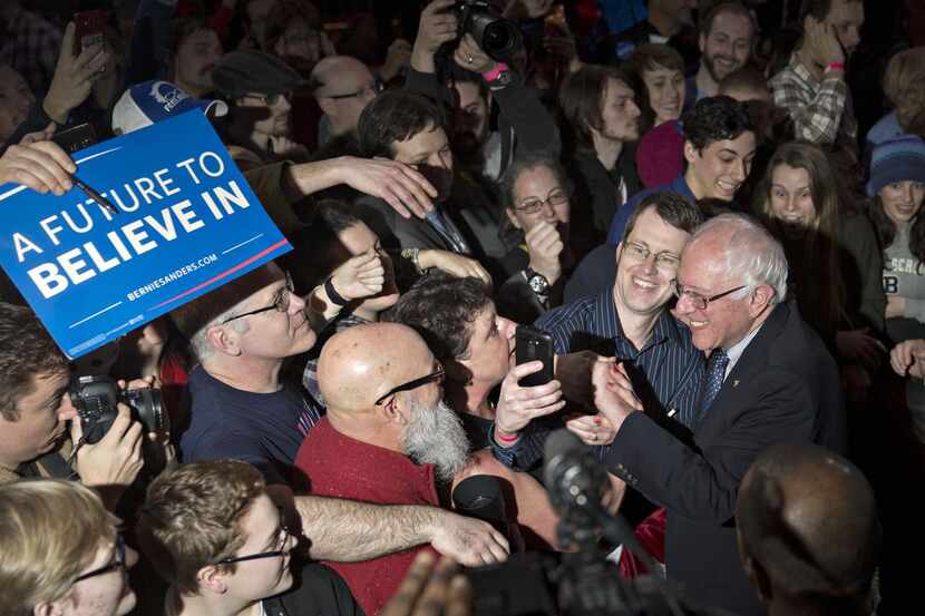 
Democratic presidential candidate Sen. Bernie Sanders greets supporters after speaking...