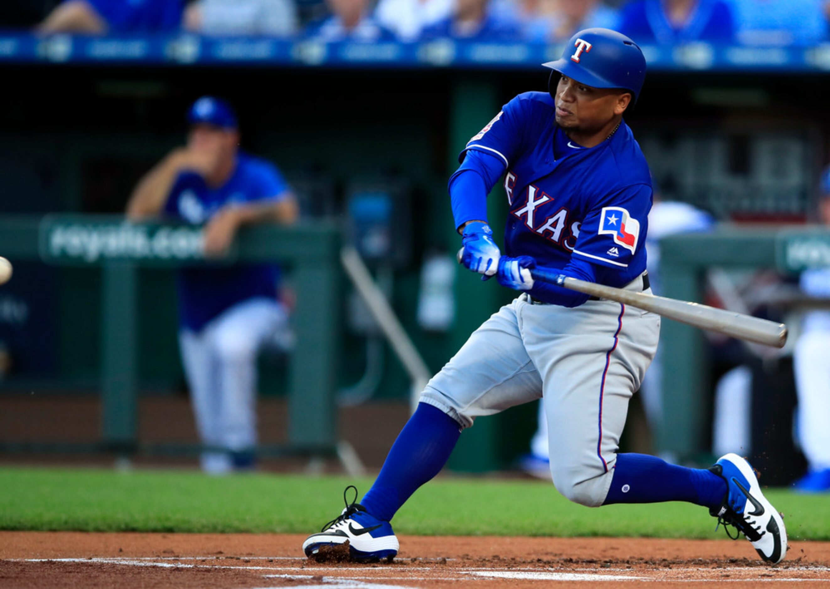 Texas Rangers designated hitter Willie Calhoun hits a two-run home run off Kansas City...