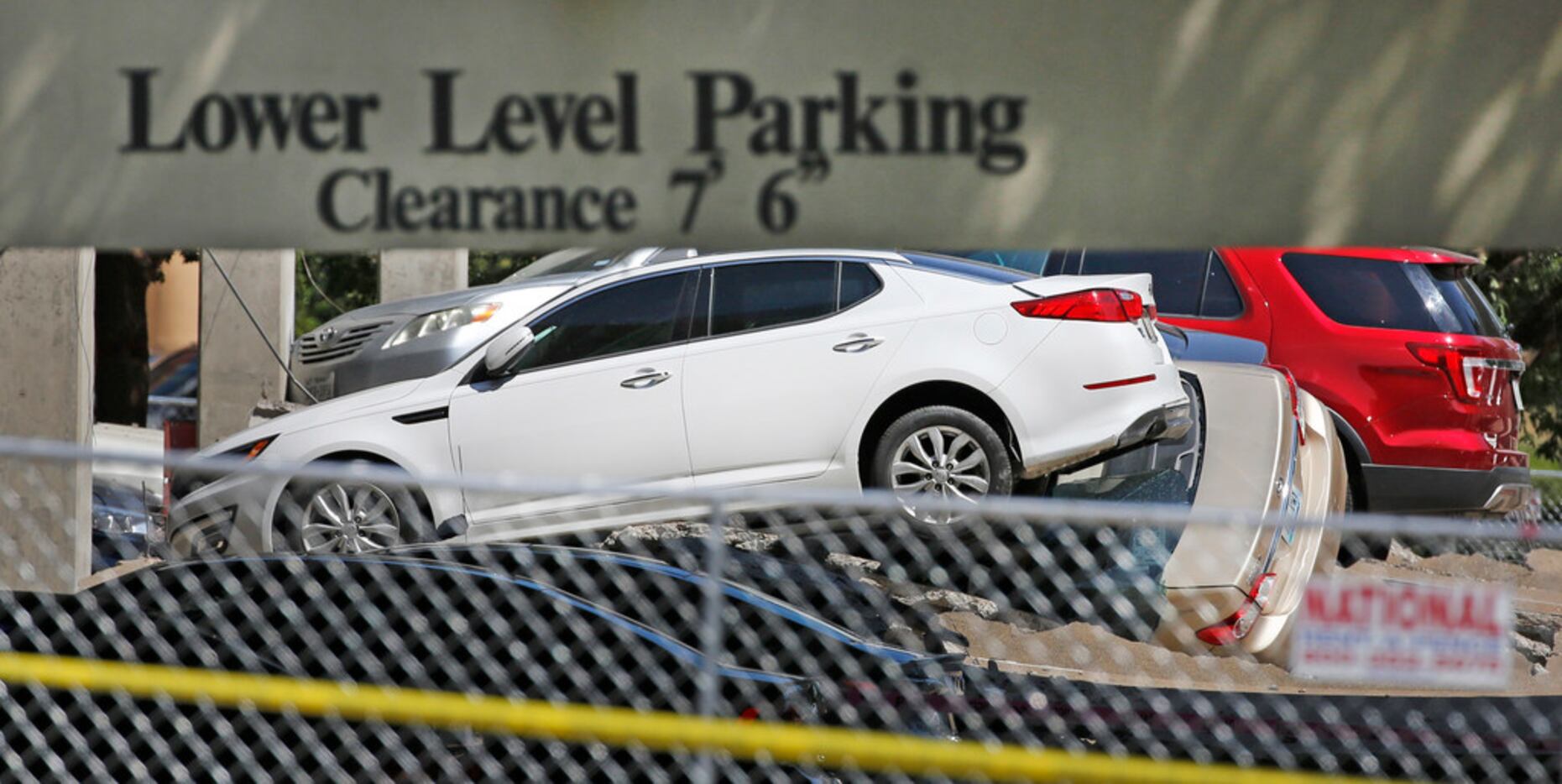 The scene at the parking garage collapse in Irving, the day after the destruction,...