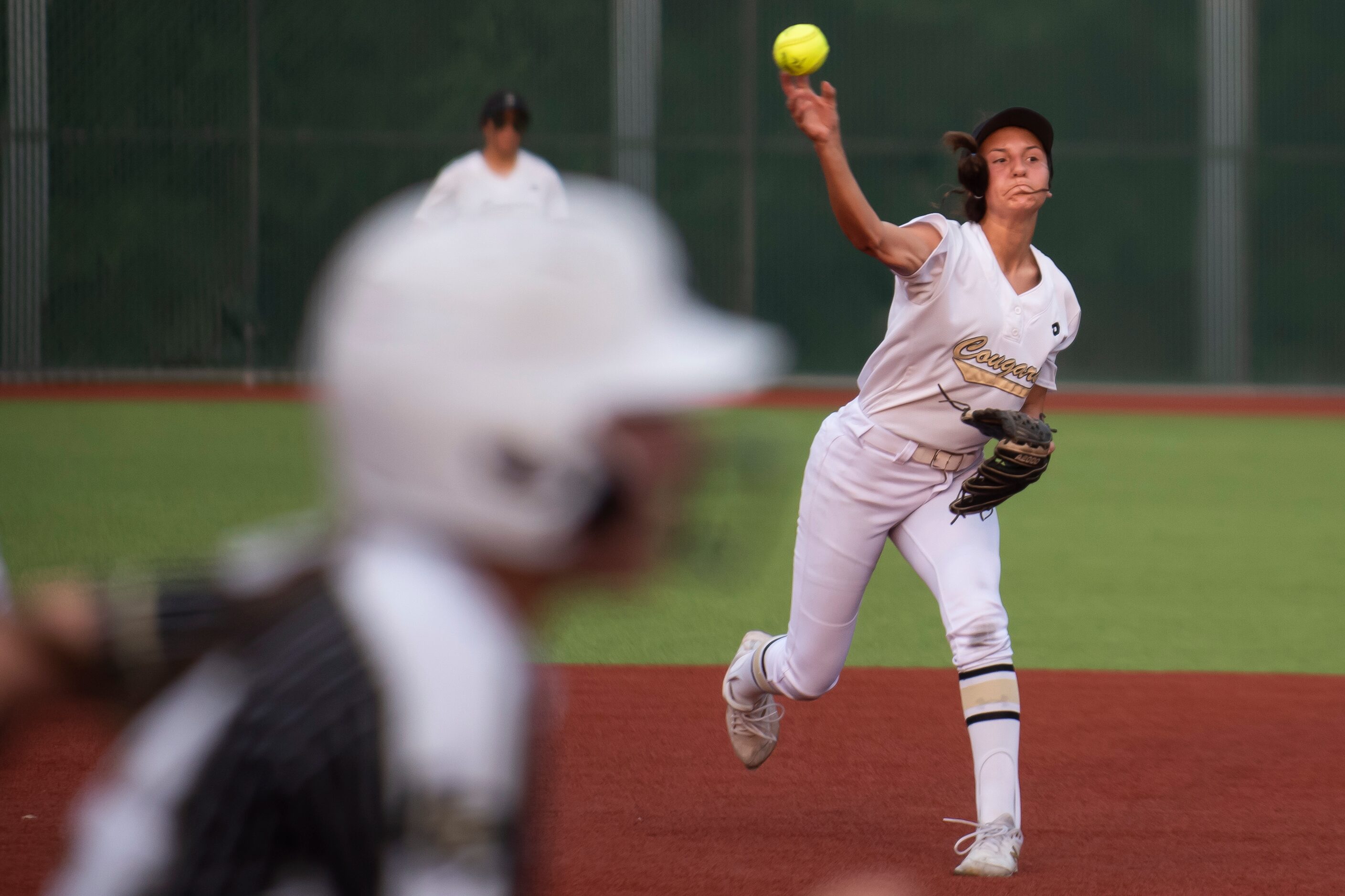 The Colony’s Sabrina Wick (7) throws to first base in an attempt to make an out during game...