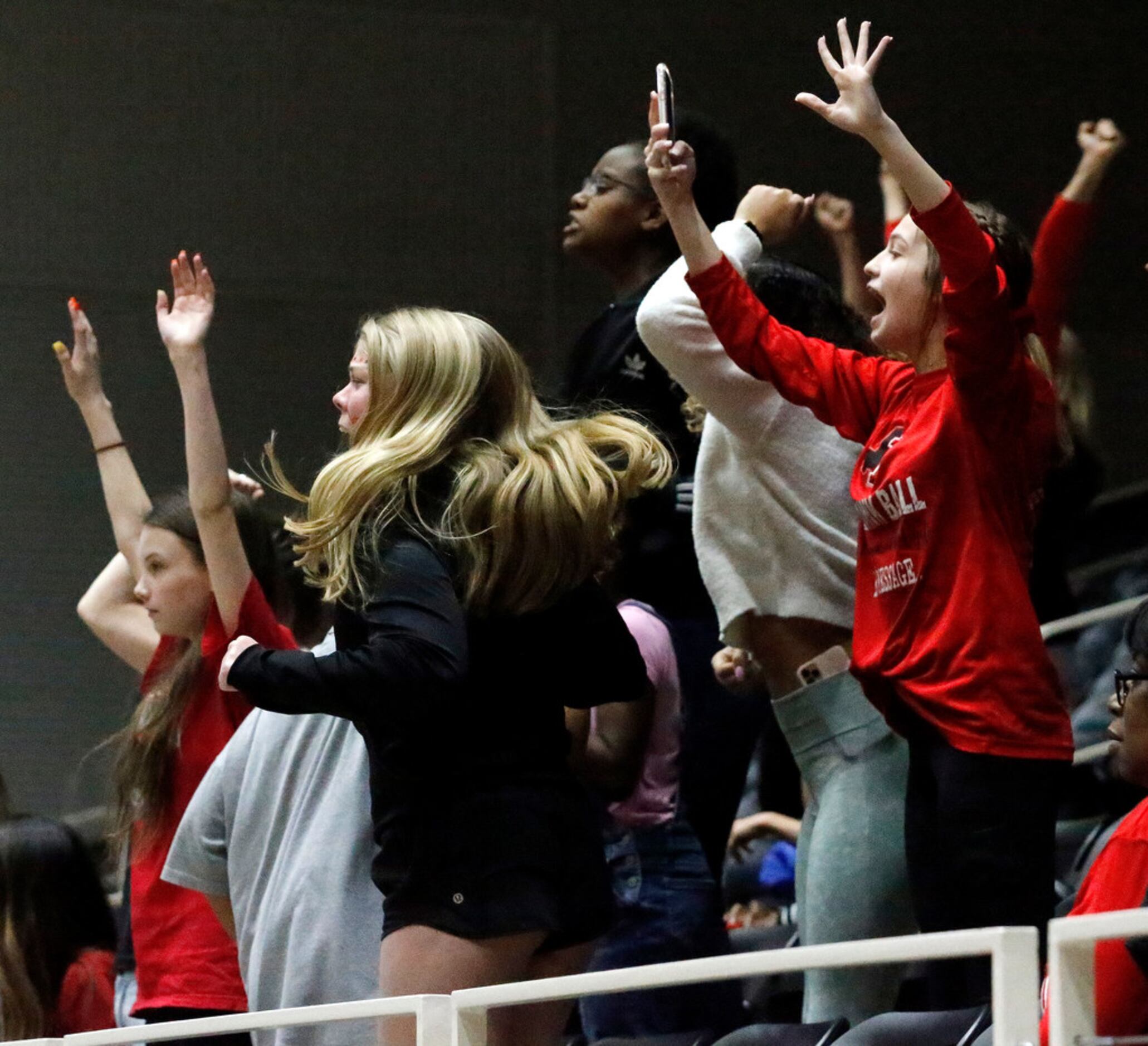 Liberty High School fans cheer in overtime as Midlothian High School hosted Frisco Liberty...
