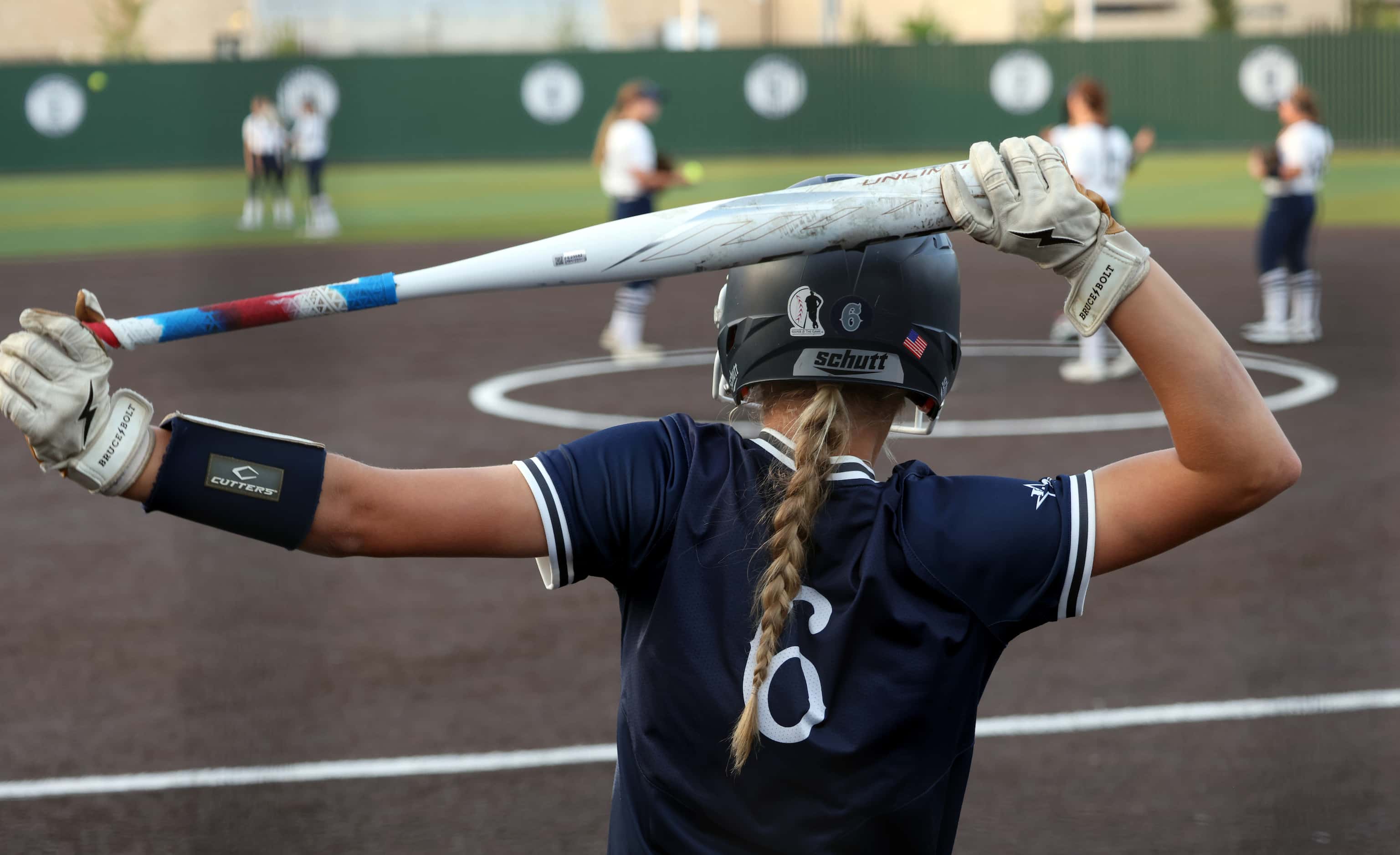 Frisco Lone Star catcher Brooke Wooten (6) stretches in the on-deck circle before leading...