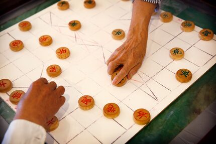 Seniors at the Golden Age senior center on in Arlington play a game together.