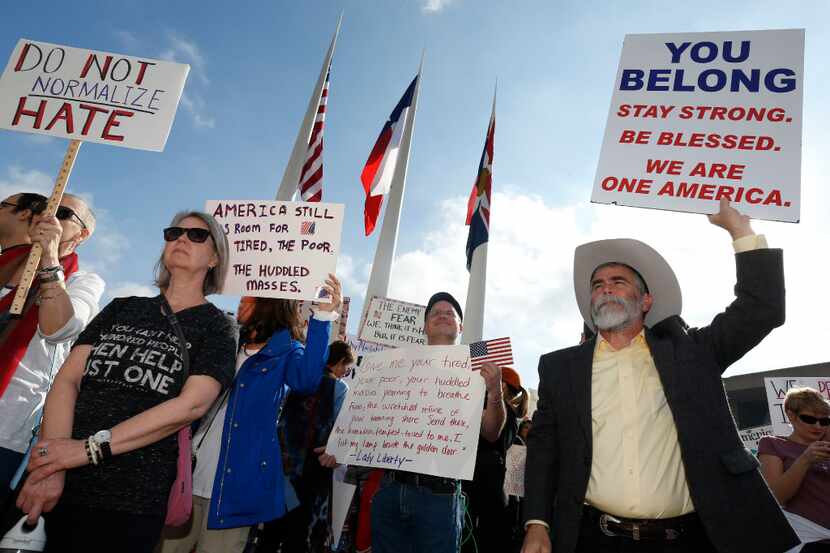 Protesters rallied in support of immigrants and refugees in downtown Dallas in February....