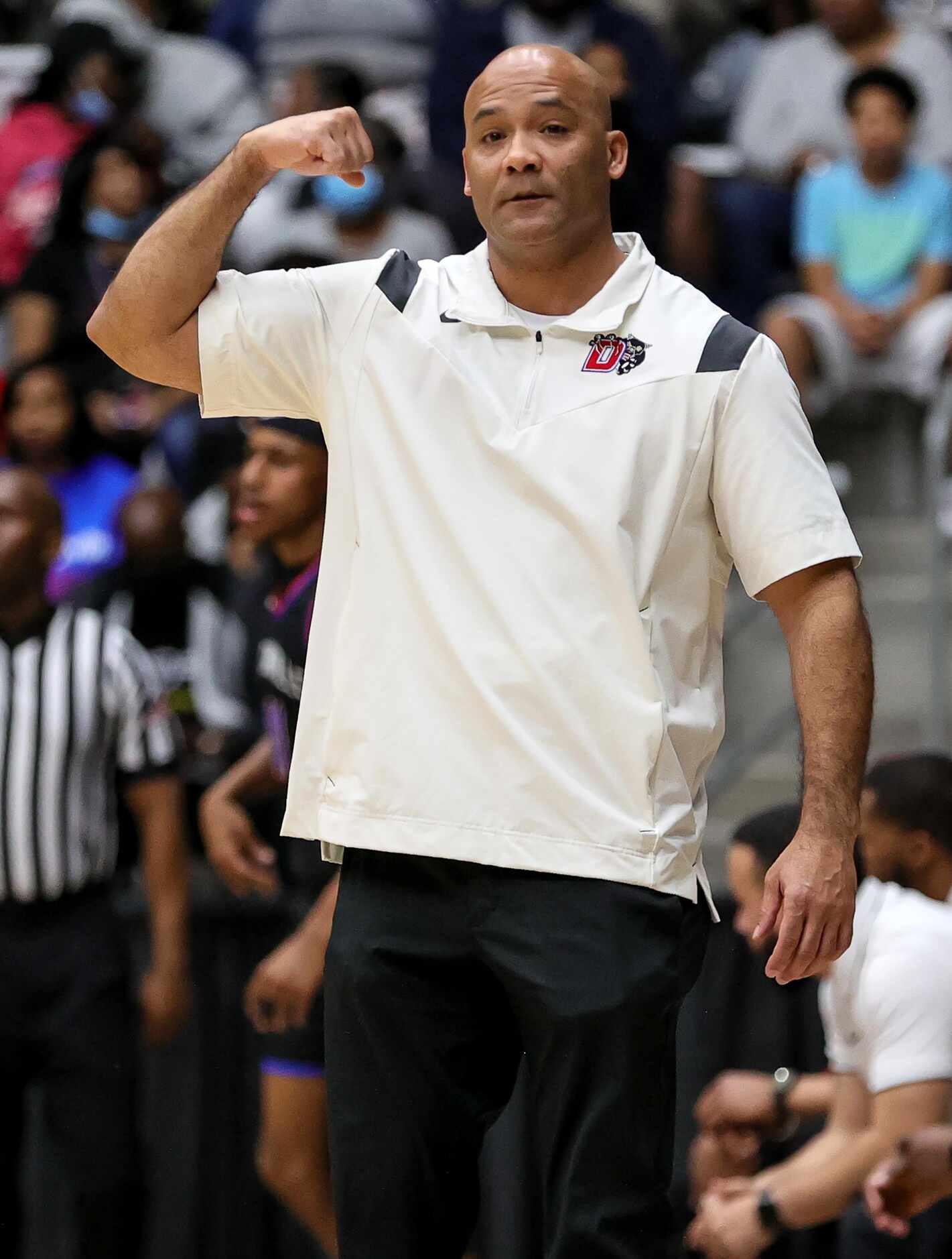 Duncanville head coach David Peavy makes a gesture during the game against DeSoto in the 6A...