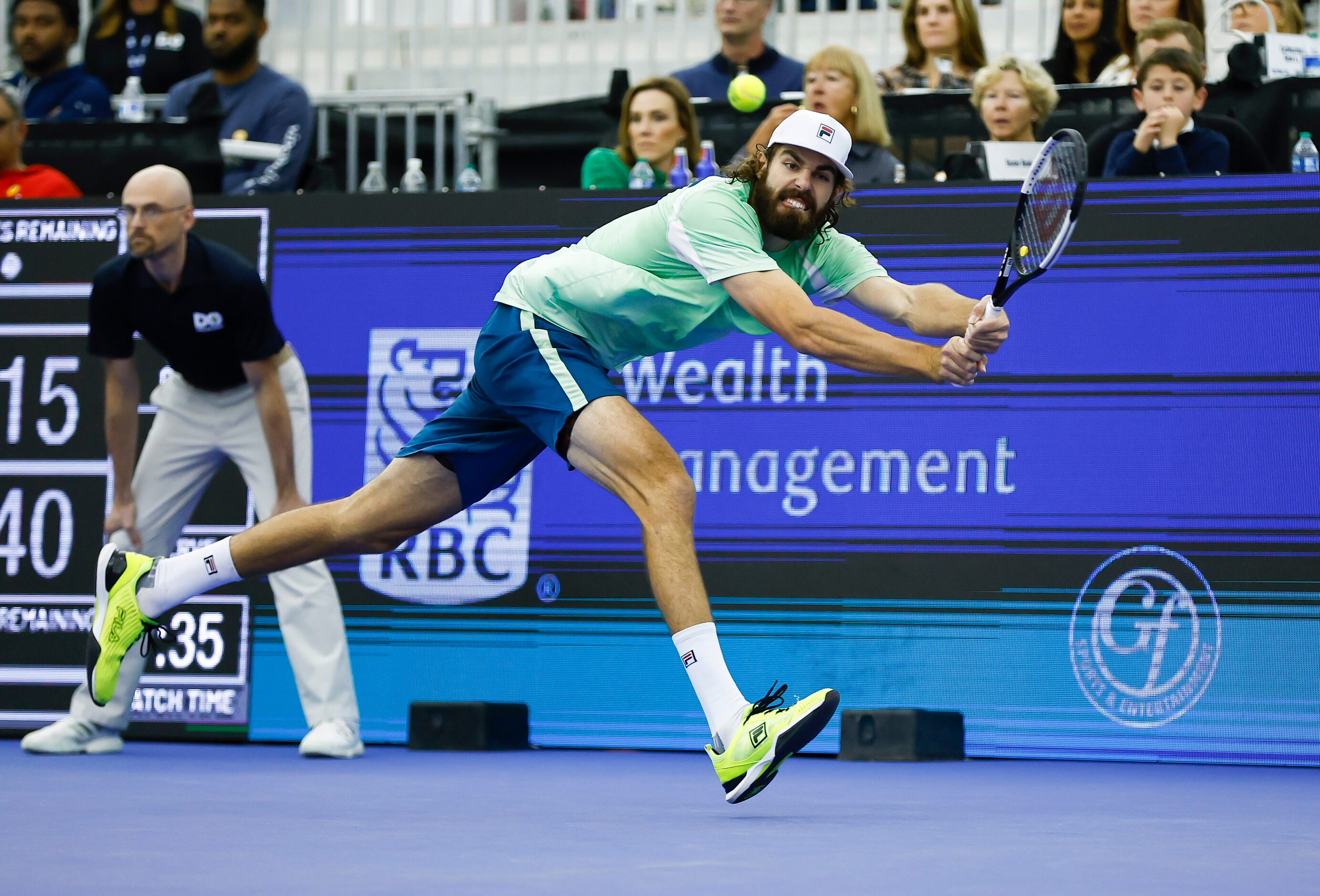 Reilly Opelka returns the ball during the finals ATP Dallas Open against Jenson Brooksby at...