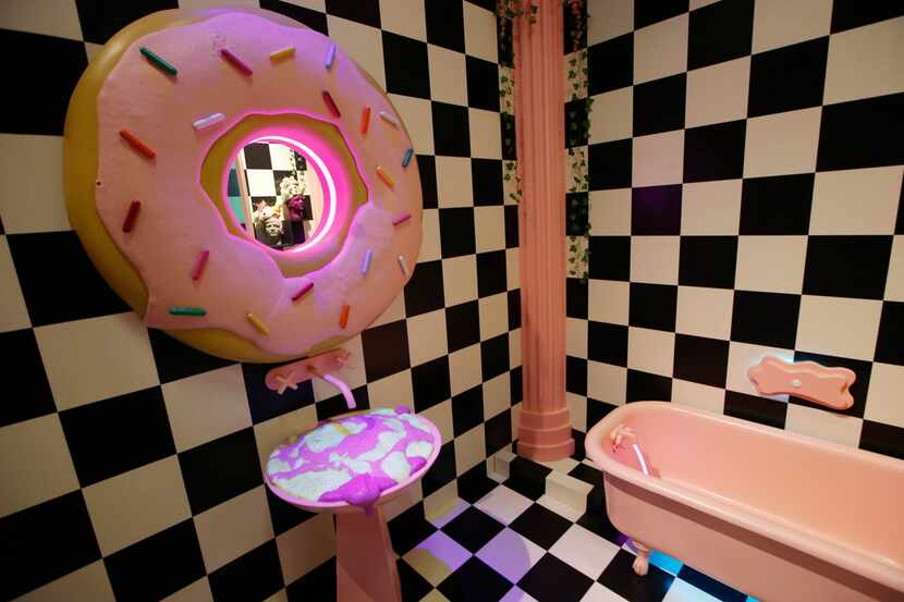 The doughnut bathroom at the Sweet Tooth Hotel in Dallas' Victory Park is lovingly called...