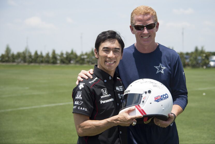 FRISCO, TX - MAY 31:  Indianapolis 500 Champion Takuma Sato shakes hands with Jason Garrett...