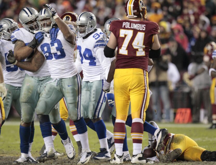 Dallas Cowboys outside linebacker Anthony Spencer (93) celebrates a sack on Washington...