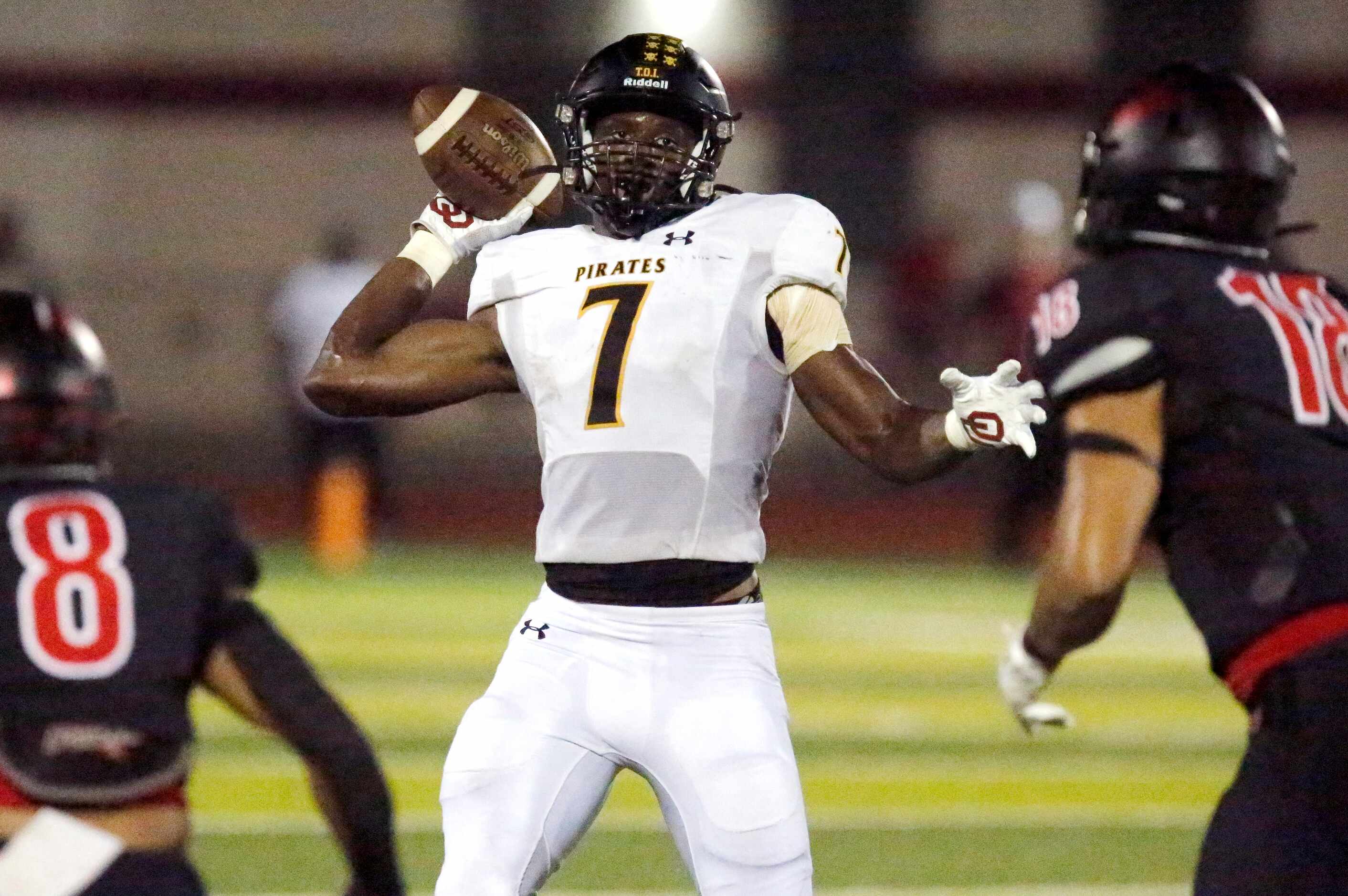 Crandall High School Samuel Omosigho (7) passes on a trick play attempt during the first...