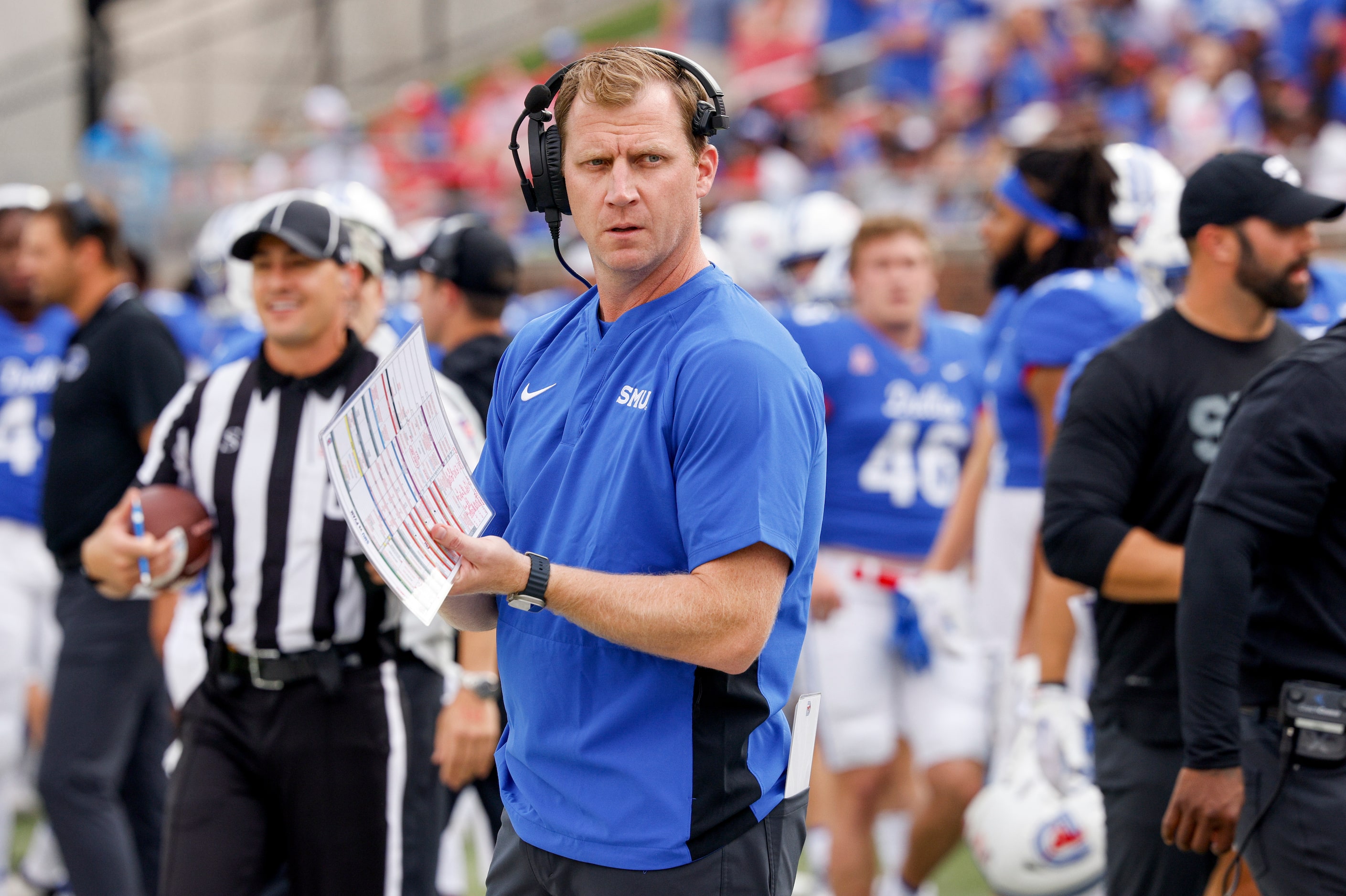 SMU head coach Rhett Lashlee walks the sideline before the first half of an NCAA football...