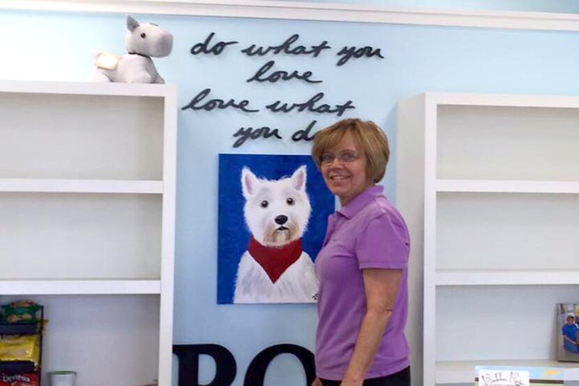  Connie Romano sets up the nook that memorializes her late Westie, Stuart.