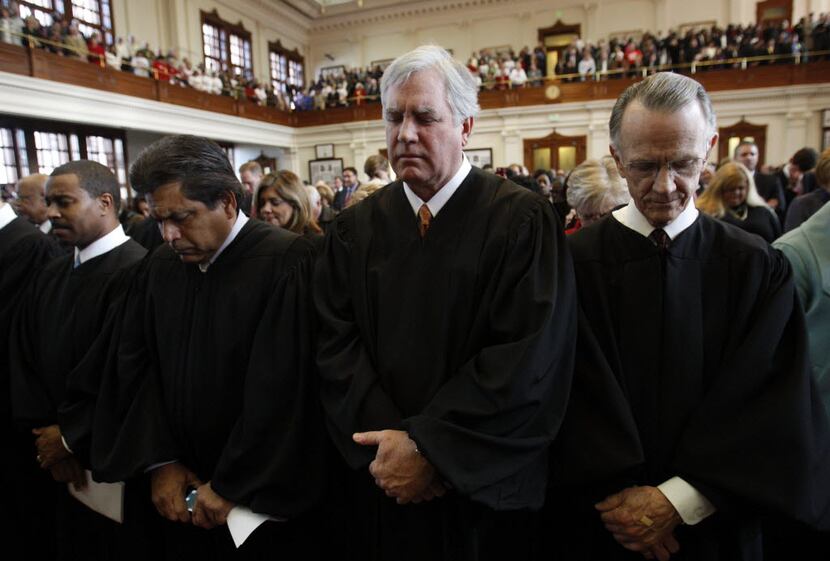 From left: Texas Supreme Court justices Dale Wainwright, David Medina, Paul Green and Phil...