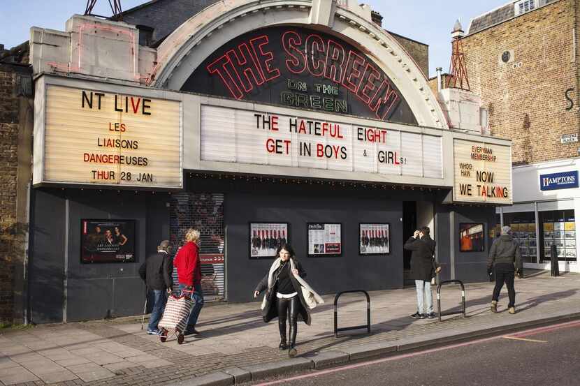 
In this Jan 10, 2016 photo, locals walk past the Screen on the Green cinema in London. With...