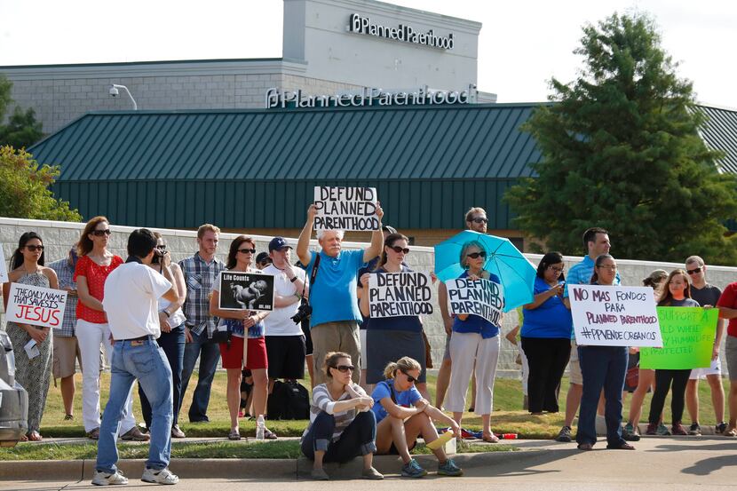 Anti-abortion activists demonstrated at the Planned Parenthood of South Dallas on West...