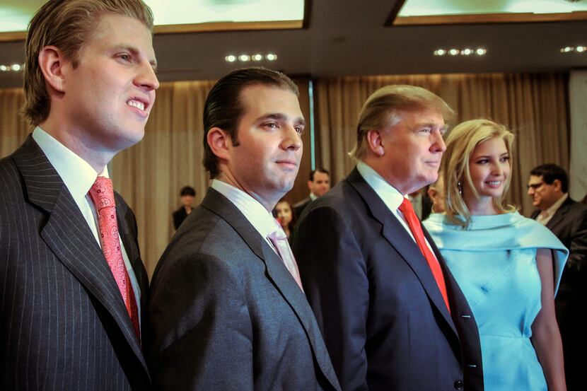 FILE - Donald Trump, chairman and CEO of the Trump Organization, poses with his children,...