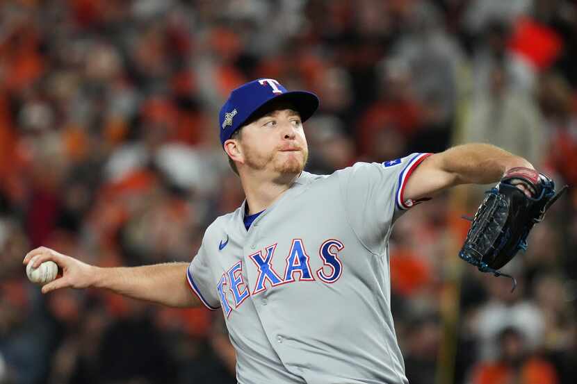 Texas Rangers relief pitcher Josh Sborz delivers during the eighth inning in Game 2 of an...