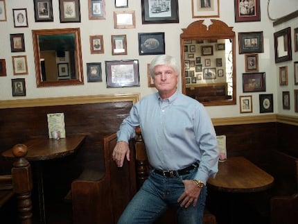 Pat Snuffer, former owner of Snuffer's Restaurant, was photographed in the 'haunted' front...