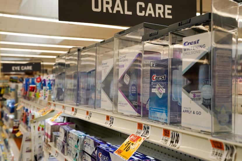 Retailers are putting more items behind locked plastic cases. 