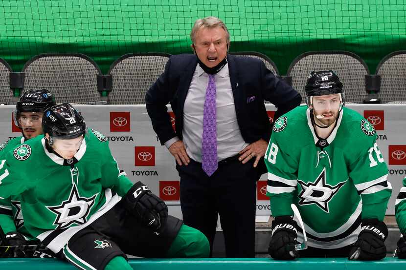 Dallas Stars head coach Rick Bowness is angry with referee Dave Lewis (46) for a late third...