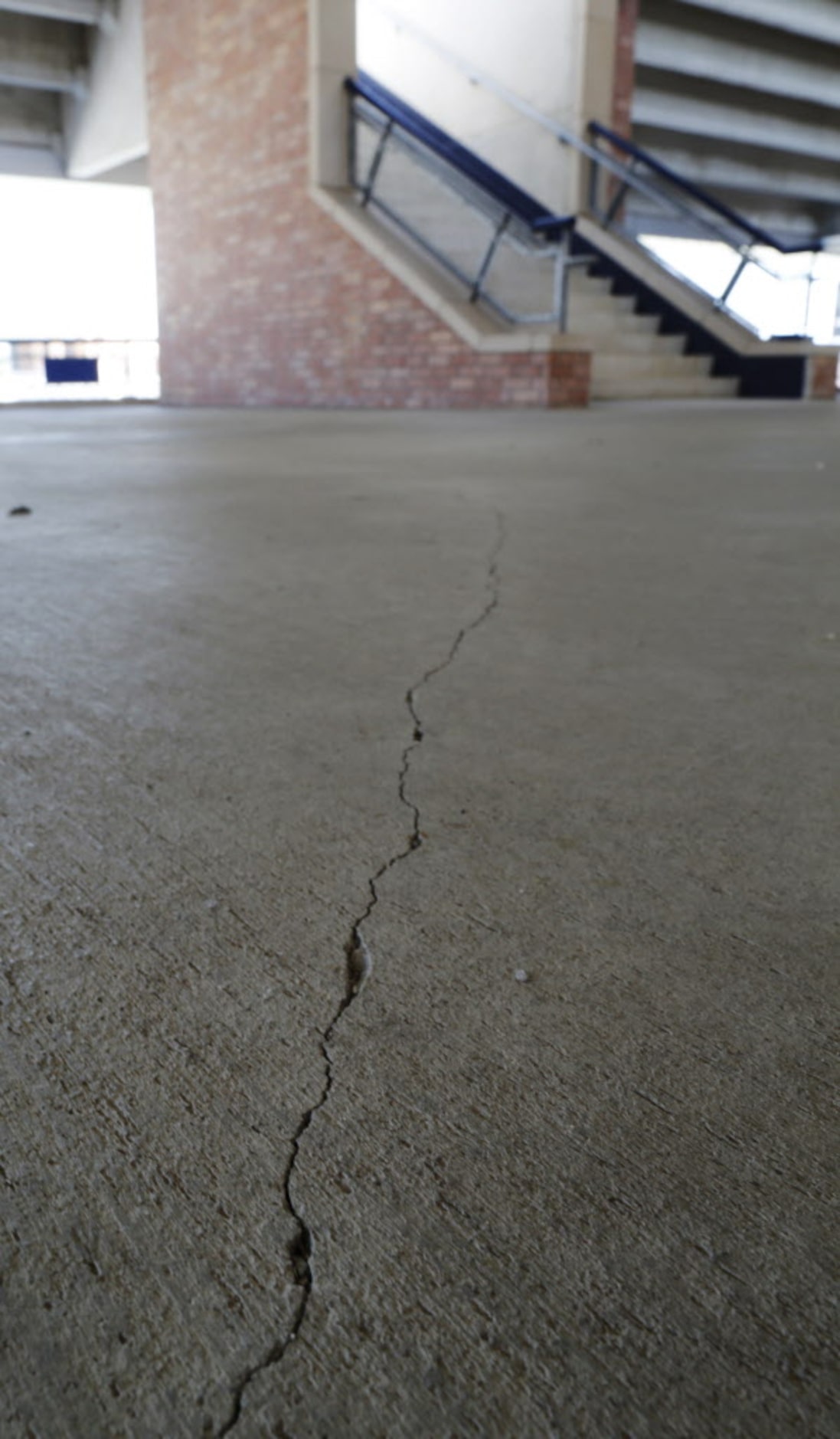 Some of the many cracks can be seen in this photo at Eagle Stadium in Allen, Texas on May...