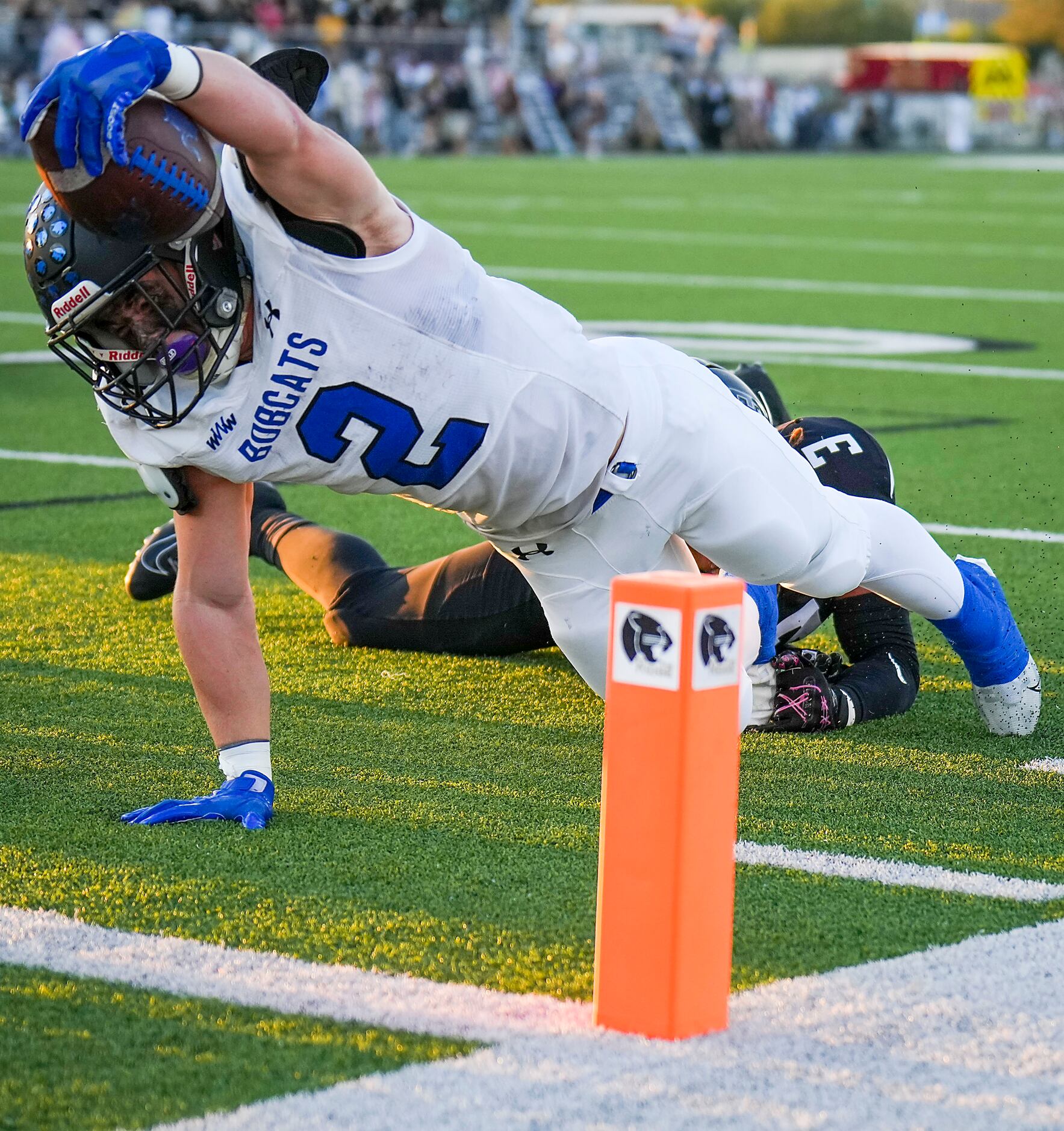 Trophy Club Byron Nelson’s Aaron Darden (2) dives for the end zone past Keller Fossil Ridge...