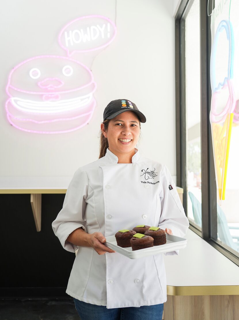 Chef Tida Pichakron with a tray of molten chocolate cake at Haute Sweets Patisserie in...