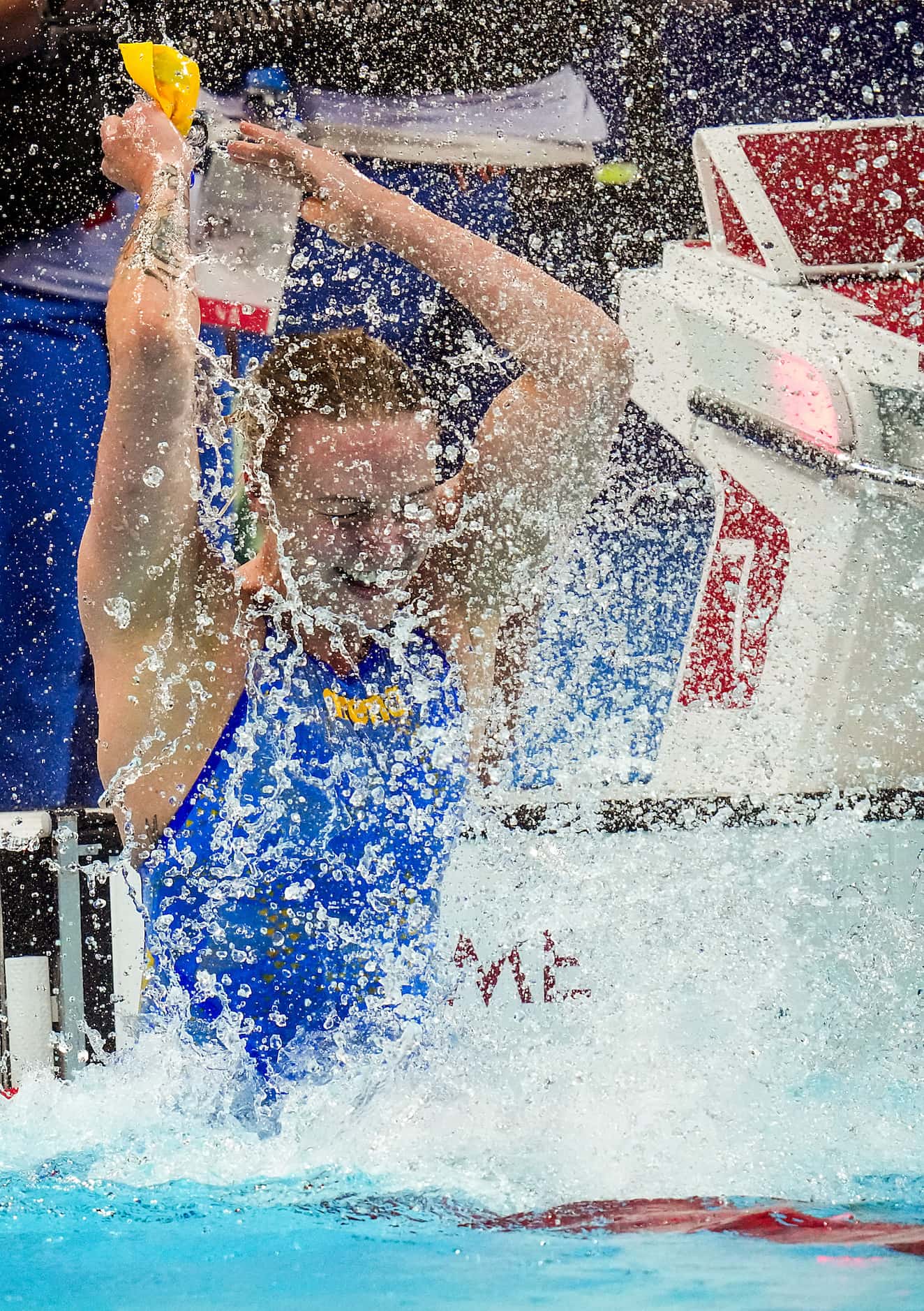 Sarah Sjoestroem of Sweden celebrates winning the women’s 100-meter freestyle final at the...