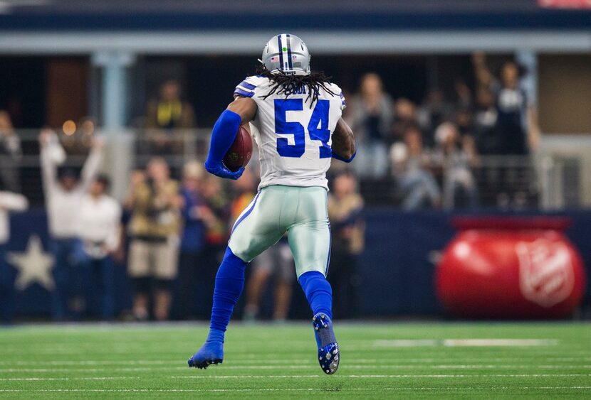 Dallas Cowboys middle linebacker Jaylon Smith (54) runs the ball to the end zone for a...