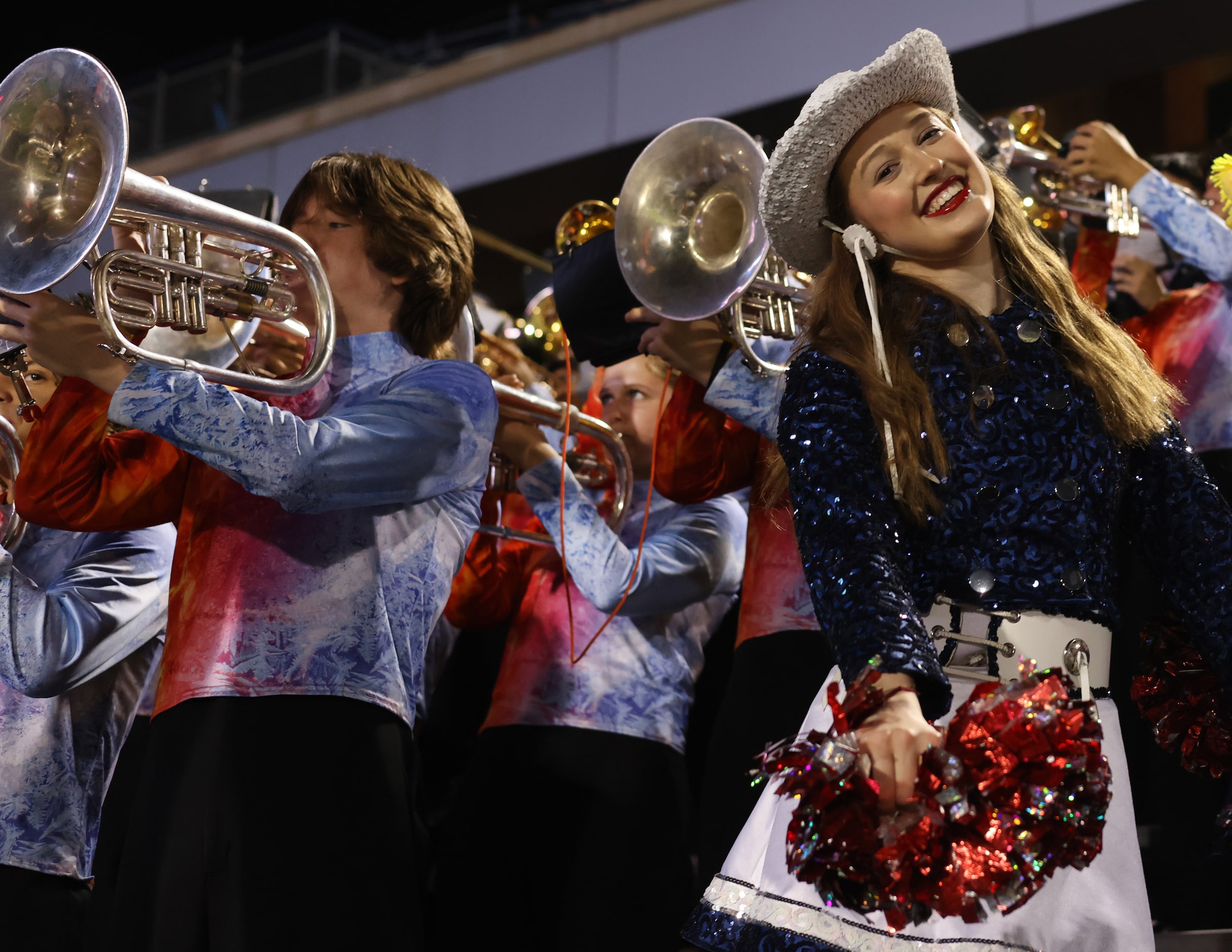 An Allen high school drill team member was all smiles as her unit performed alongside the...