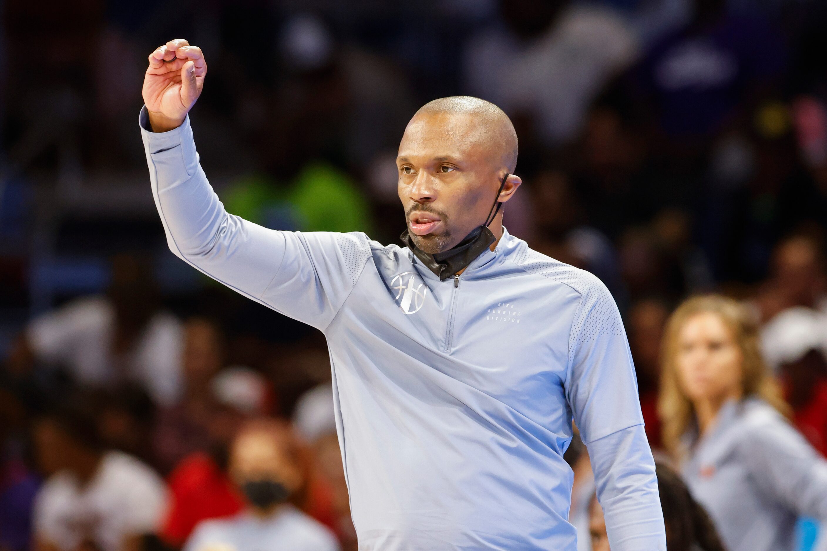 Chicago Sky head James Wade instructs the players during the second half of a WNBA...