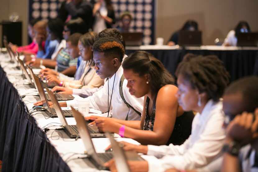 Youth filling out job applications at Opportunity Fair and Forum at McCormick Place Chicago,...