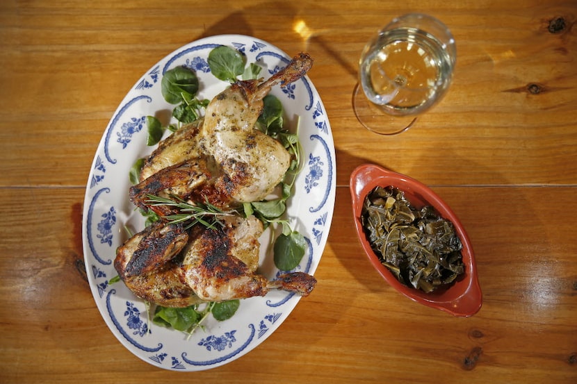 A plate of rotisserie style whole chicken marinated in herbs and citrus and side of braised...