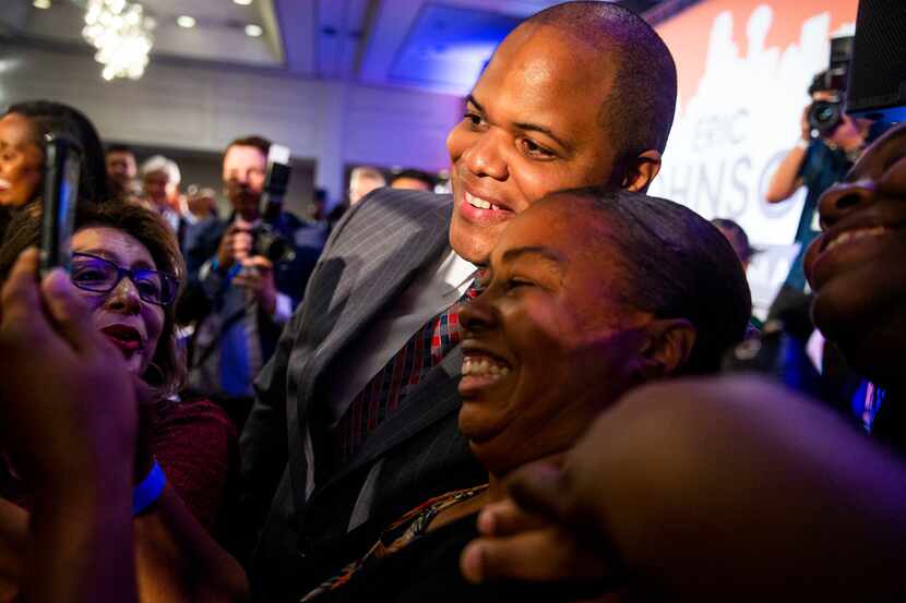 Mayor-Elect Eric Johnson takes picture with supporters after giving remarks during his...