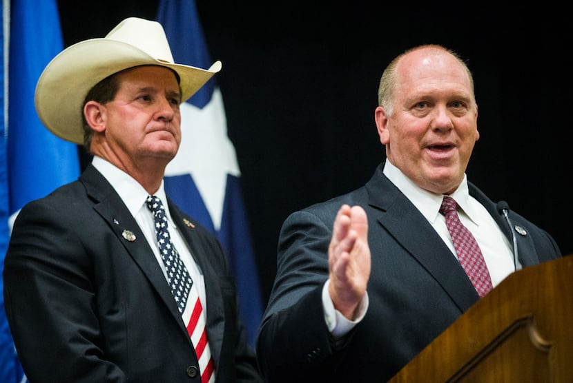 Thomas Homan (right), then acting director of U.S. Immigration and Customs Enforcement,...