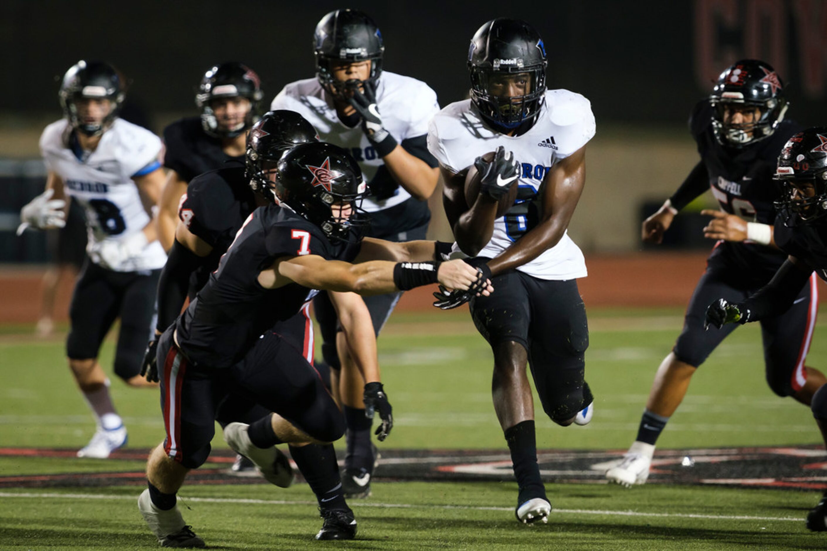 Hebron running back Jaylon Lott (6) breaks through the Coppell defense during the second...