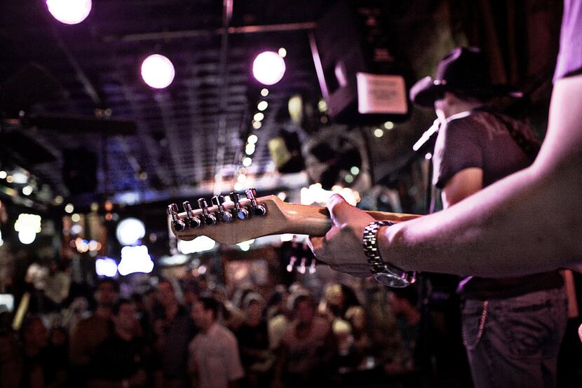 A band performs on Nashville's famed Honky Tonk Highway, which is packed with live music...
