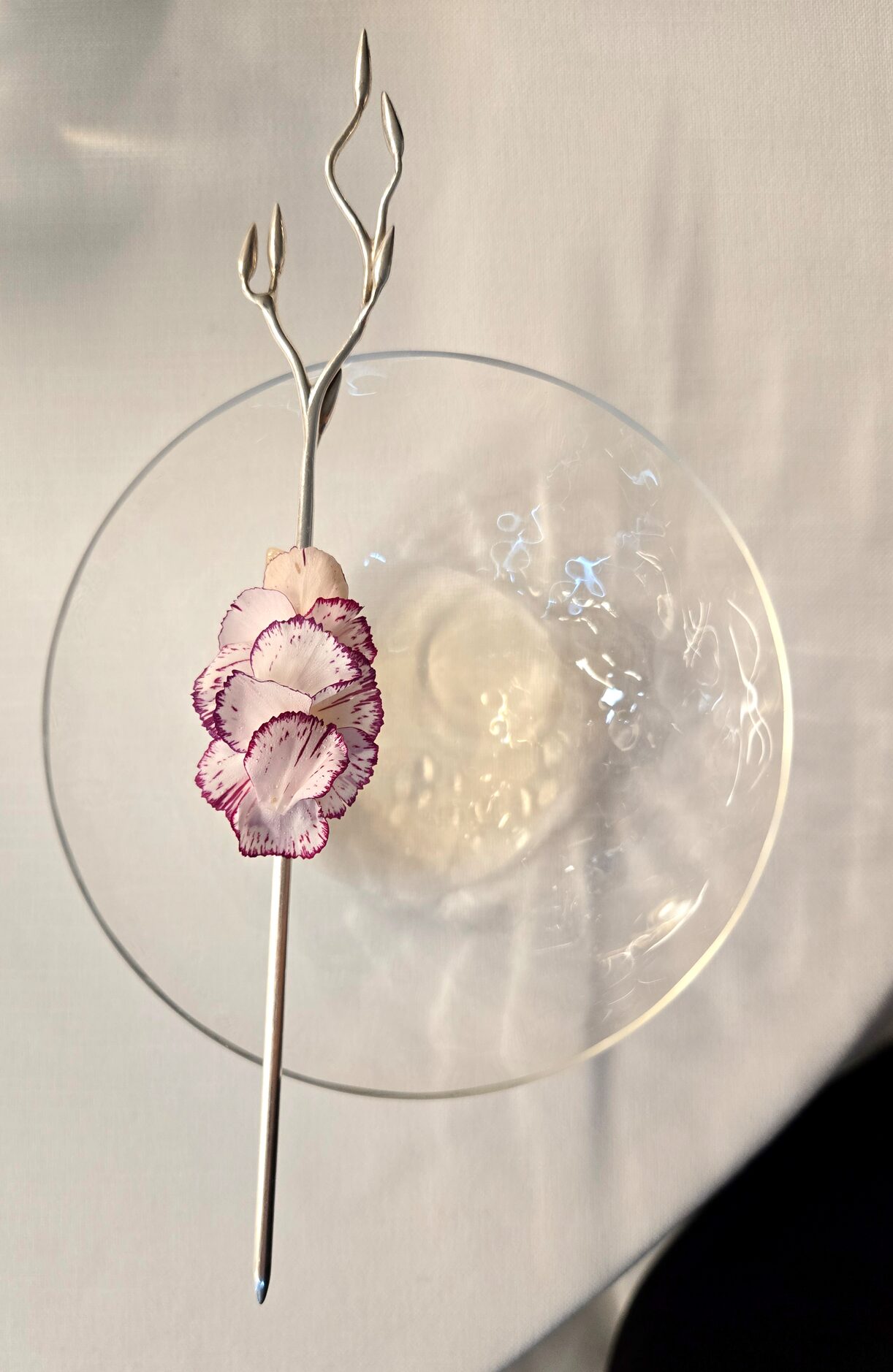 Scallops with white currant and rose are served at Jordnær in Denmark. Texas resident Aaron...