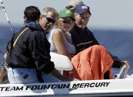 Then-President George W. Bush, his daughter Jenna Bush and former President George H.W. Bush...
