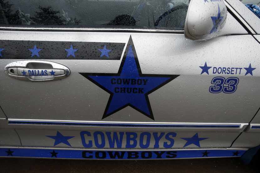 The side of CowboysLife car club member Charles 'Cowboys Chuck' Henderson's car Da Silver...