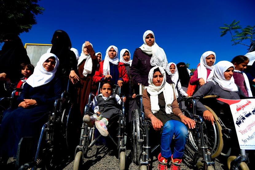Disabled Yemenis demonstrate during a protest against airstrikes on Dec. 2, the day before...