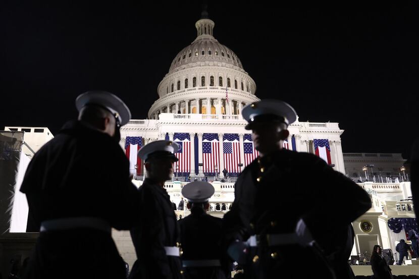 Marines stand in front of the U.S. Capitol building ahead of the 58th presidential...