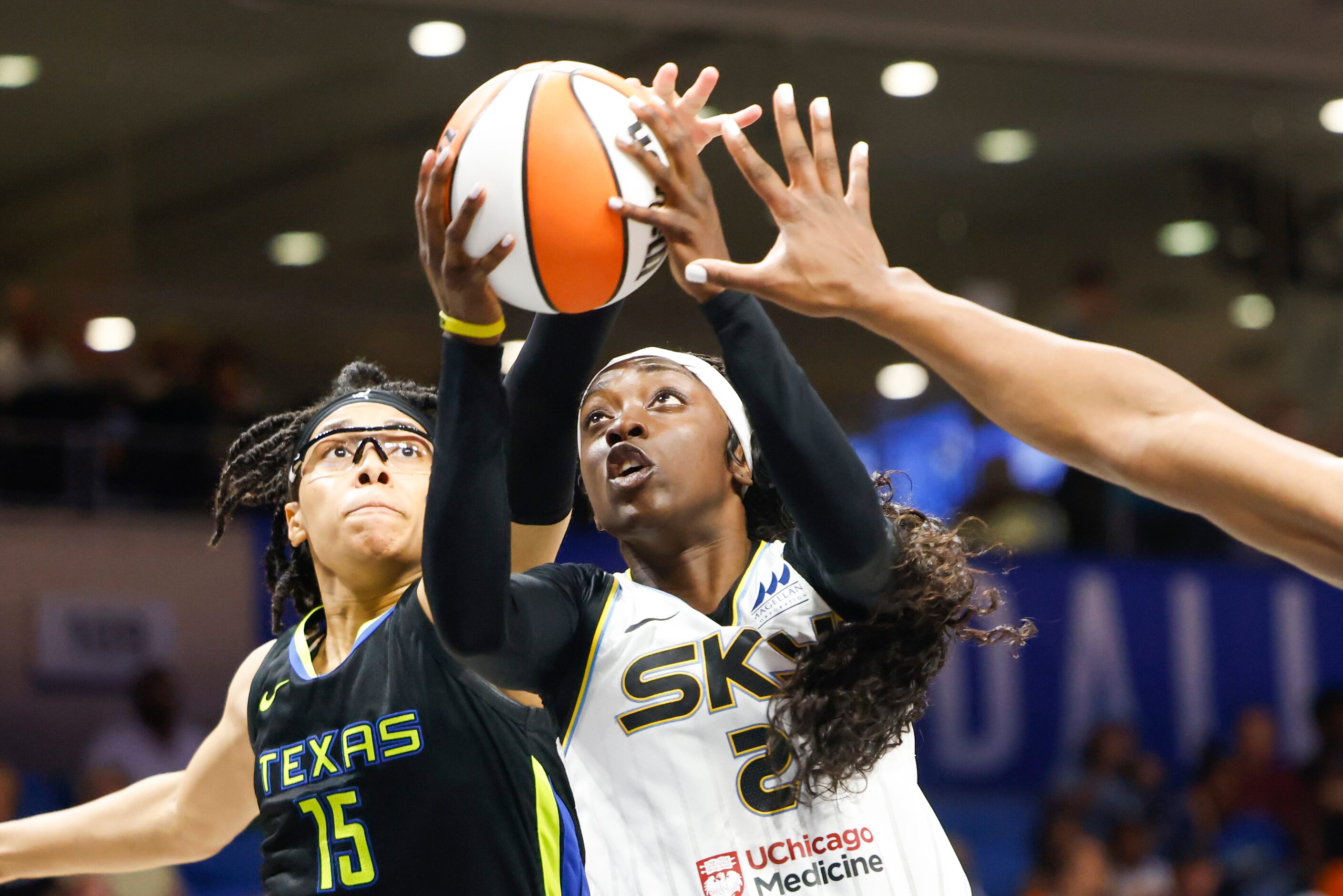 Dallas Wings guard Allisha Gray (15) attempts to block Chicago Sky guard Kahleah Copper (2)...