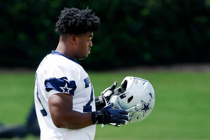 Dallas Cowboys offensive tackle Tyler Smith (73) gets ready for practice at The Star in...