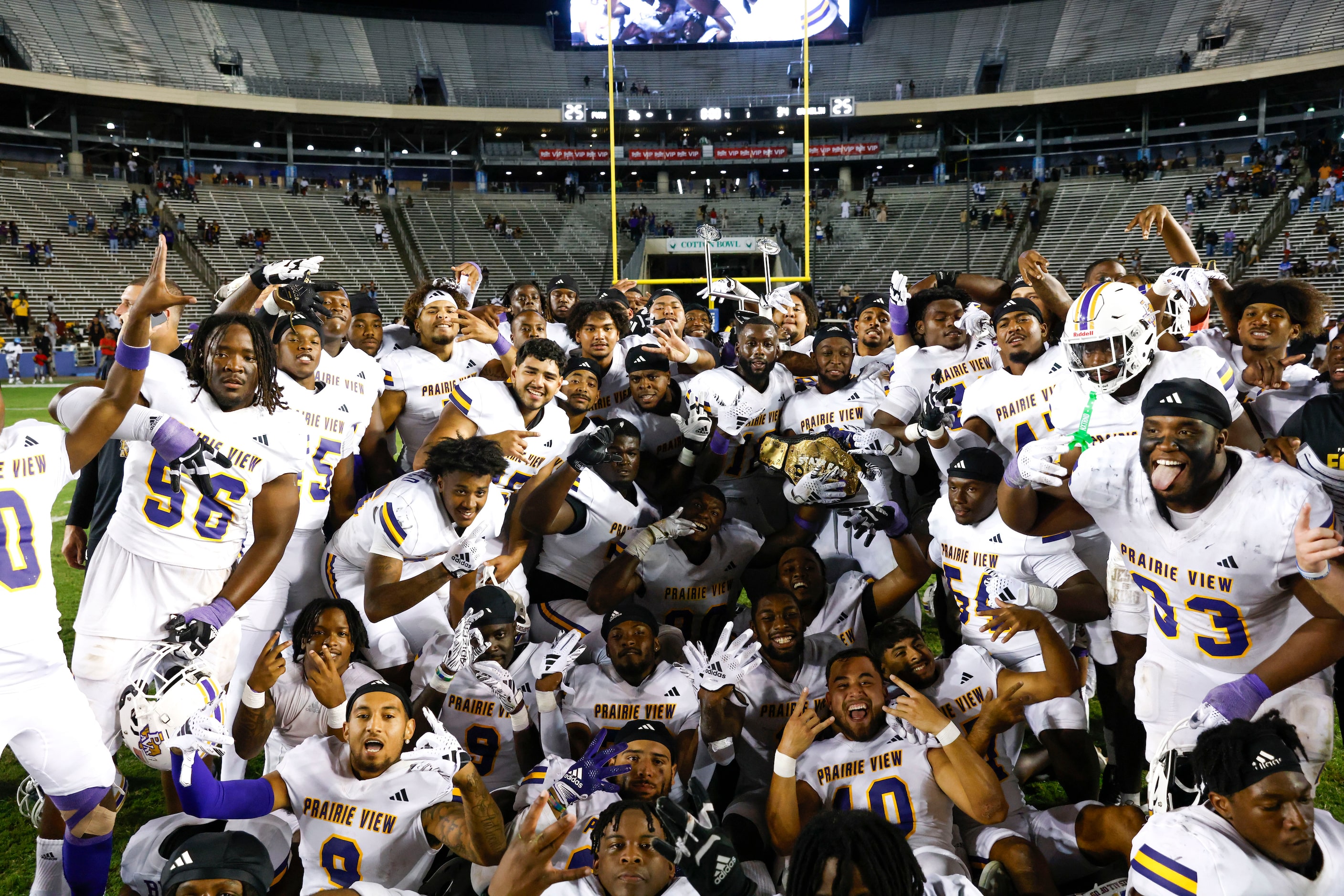 Prairie View A&M players celebrate after winning the State Fair Classic against Grambling...