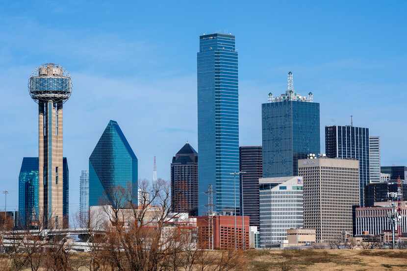 Renaissance Tower (right) stands next to Bank of America Plaza (center) on the Dallas skyline.