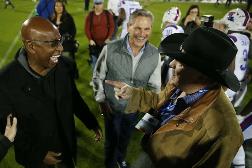 (From left) Former NFL running back Eric Dickerson, commentator Craig James and former...