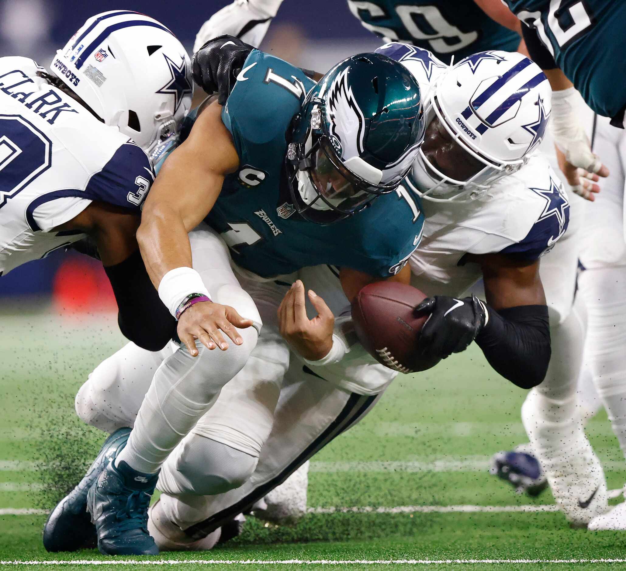 Dallas Cowboys safety Donovan Wilson (6) forces Philadelphia Eagles quarterback Jalen Hurts...
