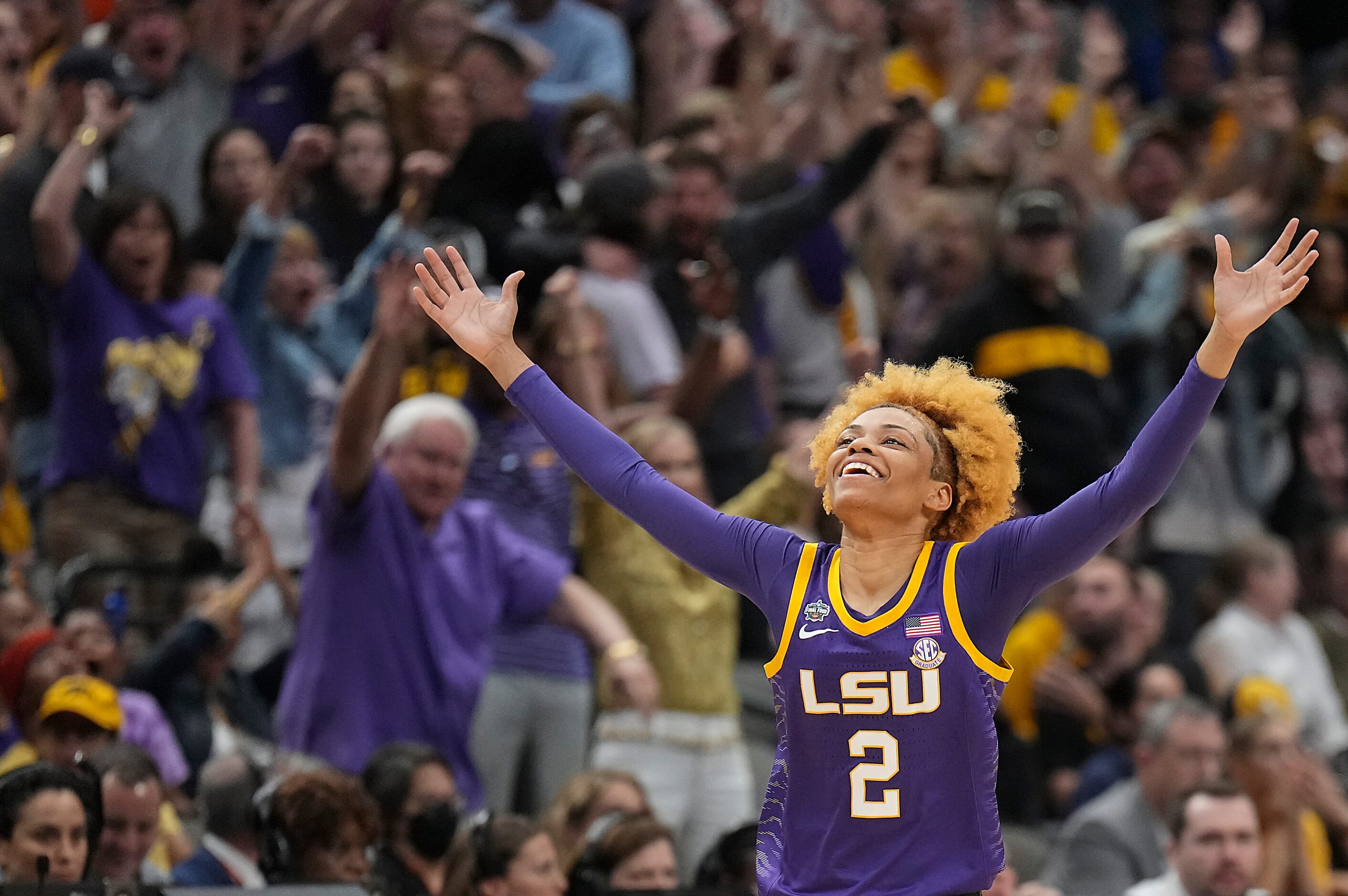 LSU guard Jasmine Carson (2) celebrates after hitting a shot at the buzzer to end the first...